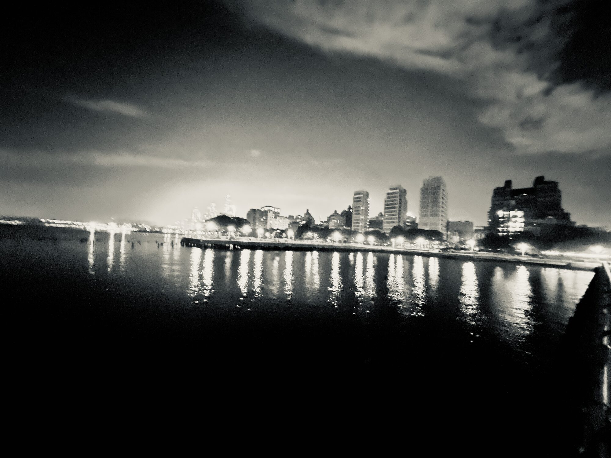 Black-and-white waterfront skyline from the photography collection